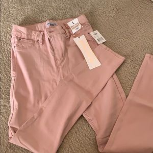 Stretch salmon colored jeans.
